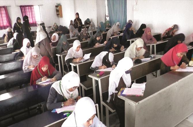 Students writing paper in talent search exam of Shaheen Academy in Nanded. (Photo: inquilab)